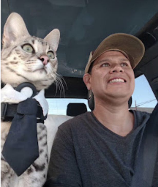 Alvaro riding with Oreo in the car